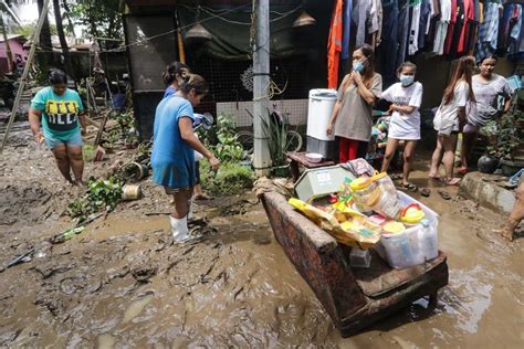 Flash floods due to Typhoon Rolly sweep away .